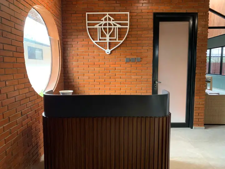 Reception desk with the crest