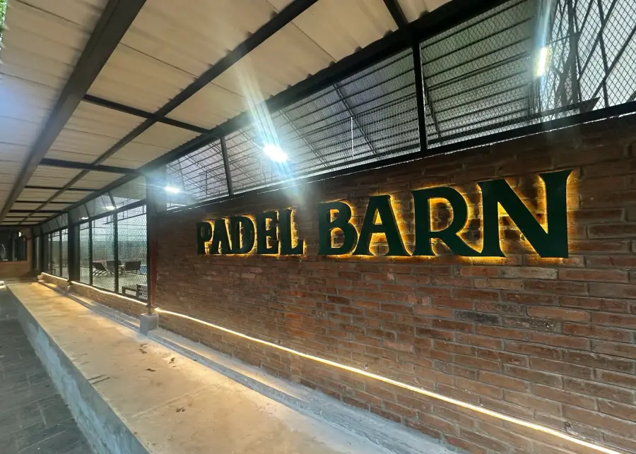 Padel Barn lettering on brick